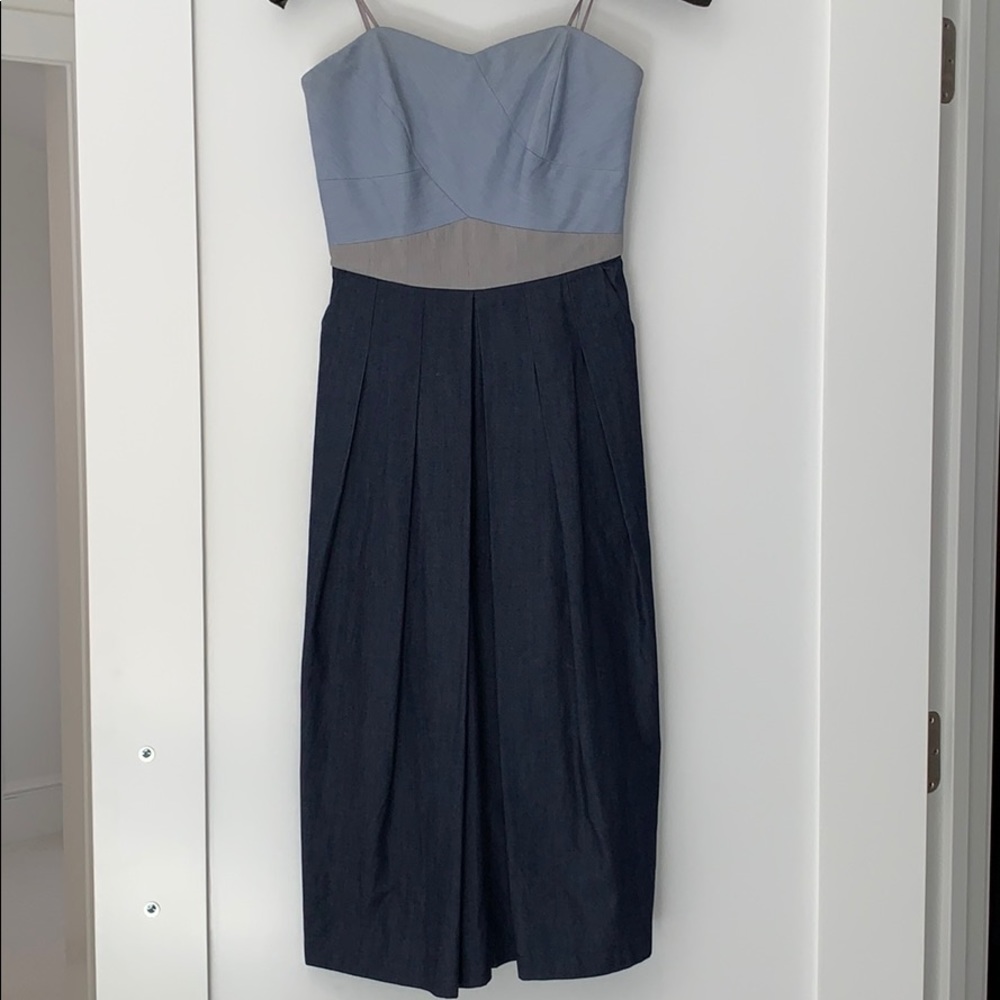 Strapless denim jumpsuit. MIDI length